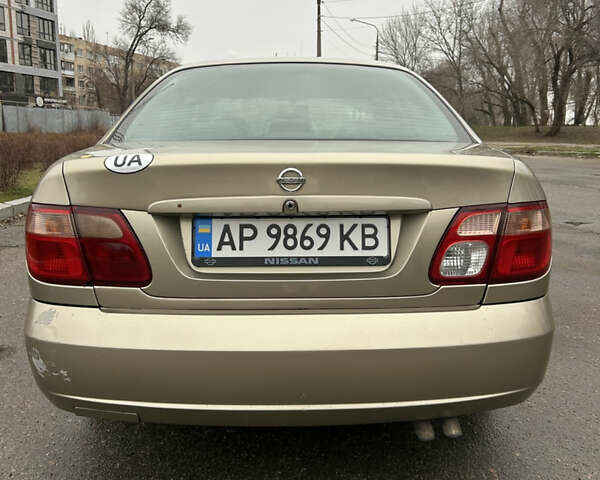 Серый Ниссан Альмера, объемом двигателя 1.5 л и пробегом 327 тыс. км за 3900 $, фото 3 на Automoto.ua