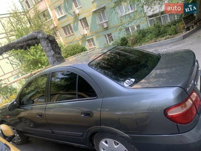 Серый Ниссан Альмера, объемом двигателя 1.5 л и пробегом 200 тыс. км за 3100 $, фото 5 на Automoto.ua