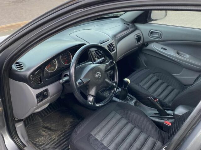 Серый Ниссан Альмера, объемом двигателя 1.5 л и пробегом 265 тыс. км за 2600 $, фото 7 на Automoto.ua