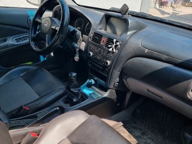 Серый Ниссан Альмера, объемом двигателя 1.5 л и пробегом 400 тыс. км за 3400 $, фото 4 на Automoto.ua