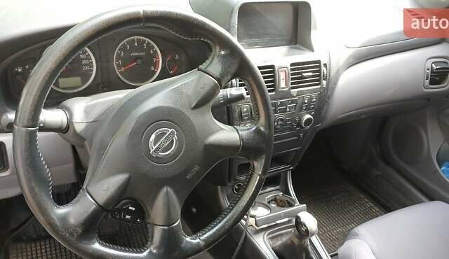 Серый Ниссан Альмера, объемом двигателя 1.5 л и пробегом 380 тыс. км за 2100 $, фото 2 на Automoto.ua