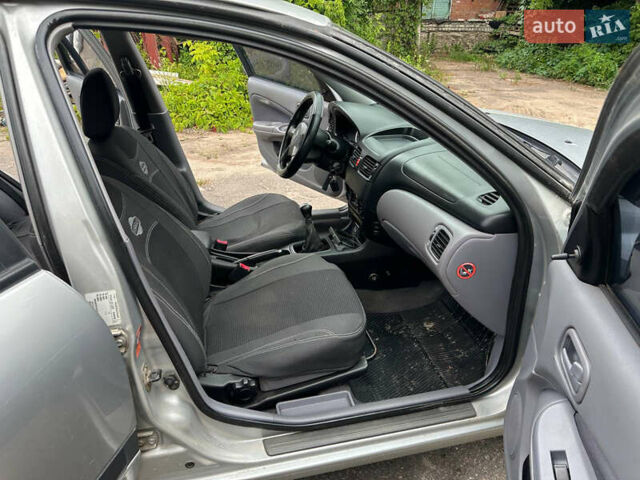 Серый Ниссан Альмера, объемом двигателя 1.5 л и пробегом 300 тыс. км за 2700 $, фото 16 на Automoto.ua