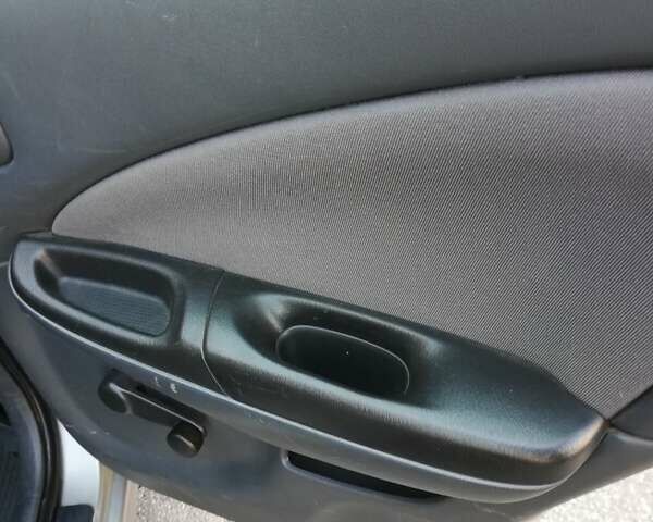 Серый Ниссан Альмера, объемом двигателя 1.5 л и пробегом 180 тыс. км за 4000 $, фото 9 на Automoto.ua