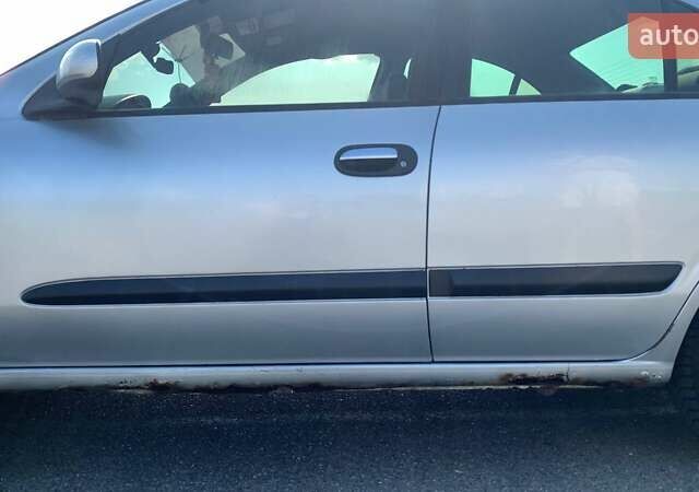 Серый Ниссан Альмера, объемом двигателя 1.77 л и пробегом 300 тыс. км за 3132 $, фото 2 на Automoto.ua