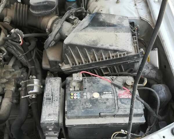 Серый Ниссан Альмера, объемом двигателя 1.5 л и пробегом 180 тыс. км за 4000 $, фото 4 на Automoto.ua