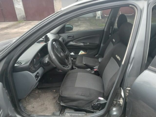 Серый Ниссан Альмера, объемом двигателя 1.5 л и пробегом 200 тыс. км за 4500 $, фото 6 на Automoto.ua