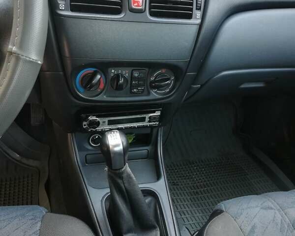 Серый Ниссан Альмера, объемом двигателя 1.5 л и пробегом 180 тыс. км за 4000 $, фото 21 на Automoto.ua