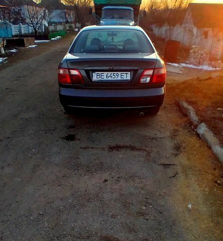 Серый Ниссан Альмера, объемом двигателя 1.8 л и пробегом 260 тыс. км за 3950 $, фото 4 на Automoto.ua