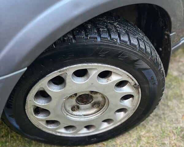 Сірий Ніссан Альмера, об'ємом двигуна 1.5 л та пробігом 352 тис. км за 3600 $, фото 7 на Automoto.ua