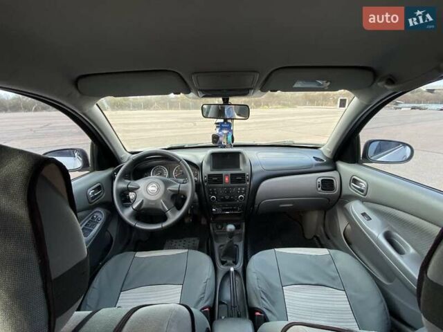 Сірий Ніссан Альмера, об'ємом двигуна 1.5 л та пробігом 290 тис. км за 3900 $, фото 24 на Automoto.ua