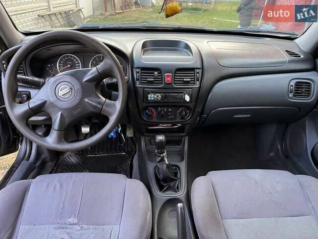 Сірий Ніссан Альмера, об'ємом двигуна 1.5 л та пробігом 352 тис. км за 3600 $, фото 9 на Automoto.ua