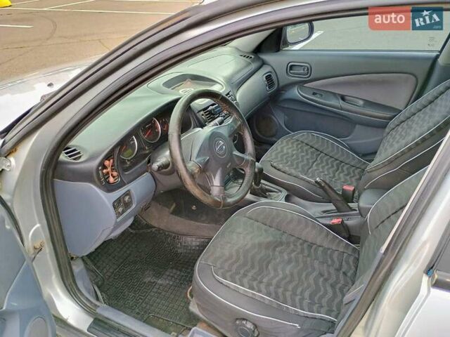 Серый Ниссан Альмера, объемом двигателя 1.6 л и пробегом 302 тыс. км за 2400 $, фото 16 на Automoto.ua