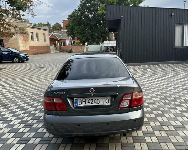 Серый Ниссан Альмера, объемом двигателя 1.5 л и пробегом 220 тыс. км за 4000 $, фото 11 на Automoto.ua