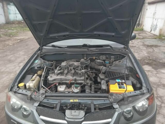 Серый Ниссан Альмера, объемом двигателя 1.5 л и пробегом 200 тыс. км за 4500 $, фото 4 на Automoto.ua