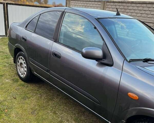 Сірий Ніссан Альмера, об'ємом двигуна 1.5 л та пробігом 352 тис. км за 3600 $, фото 6 на Automoto.ua