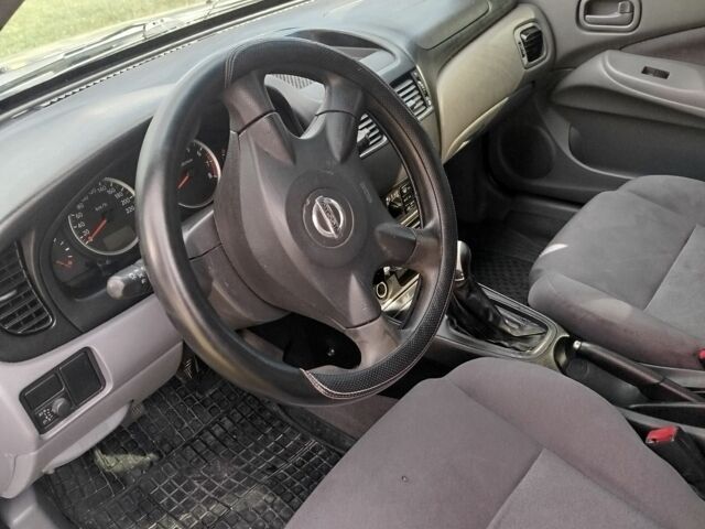 Серый Ниссан Альмера, объемом двигателя 1.5 л и пробегом 202 тыс. км за 2499 $, фото 6 на Automoto.ua