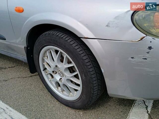 Серый Ниссан Альмера, объемом двигателя 1.6 л и пробегом 302 тыс. км за 2400 $, фото 4 на Automoto.ua