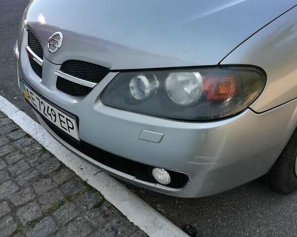 Серый Ниссан Альмера, объемом двигателя 1.5 л и пробегом 180 тыс. км за 4000 $, фото 2 на Automoto.ua