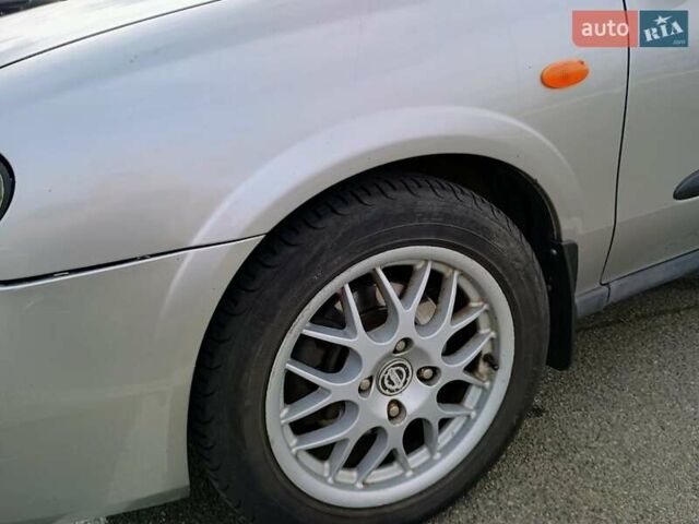 Серый Ниссан Альмера, объемом двигателя 1.6 л и пробегом 302 тыс. км за 2400 $, фото 5 на Automoto.ua