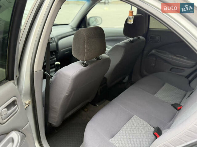 Сірий Ніссан Альмера, об'ємом двигуна 1.5 л та пробігом 204 тис. км за 2950 $, фото 6 на Automoto.ua