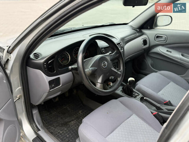 Серый Ниссан Альмера, объемом двигателя 1.5 л и пробегом 204 тыс. км за 3350 $, фото 5 на Automoto.ua