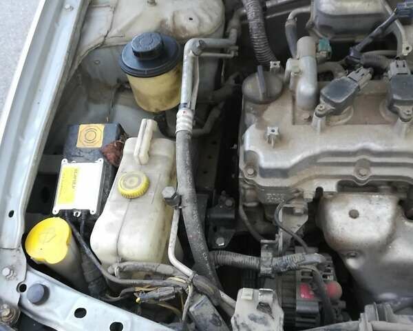 Серый Ниссан Альмера, объемом двигателя 1.5 л и пробегом 180 тыс. км за 4000 $, фото 8 на Automoto.ua