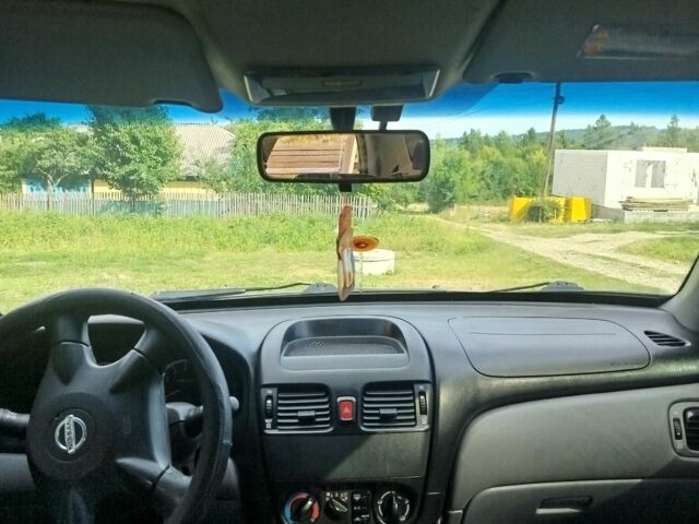 Серый Ниссан Альмера, объемом двигателя 1.5 л и пробегом 202 тыс. км за 2499 $, фото 7 на Automoto.ua