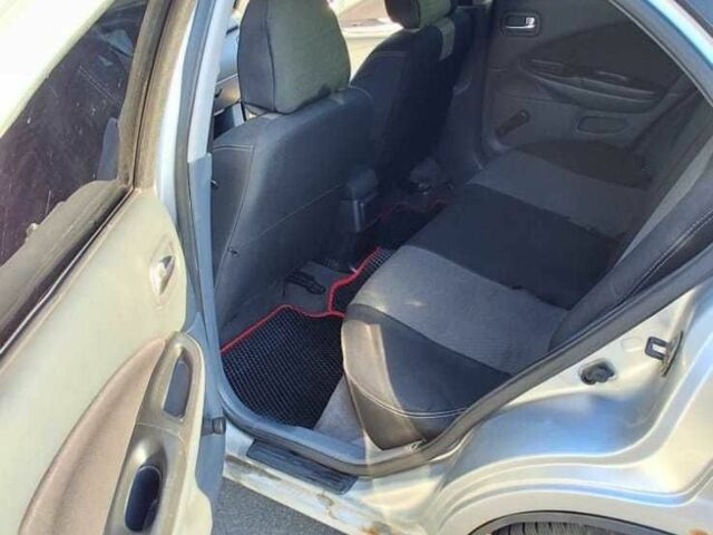 Серый Ниссан Альмера, объемом двигателя 1.5 л и пробегом 3 тыс. км за 2500 $, фото 10 на Automoto.ua