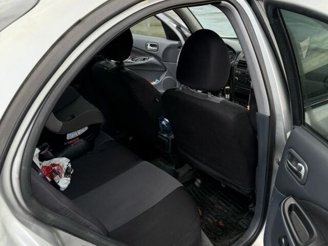 Серый Ниссан Альмера, объемом двигателя 1.5 л и пробегом 540 тыс. км за 3600 $, фото 2 на Automoto.ua