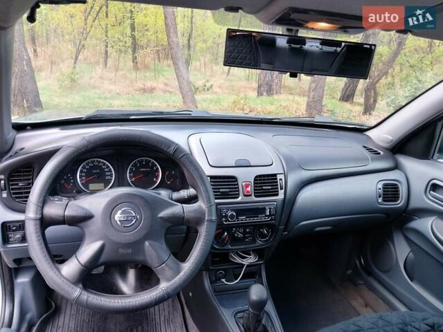 Серый Ниссан Альмера, объемом двигателя 1.5 л и пробегом 300 тыс. км за 3999 $, фото 14 на Automoto.ua