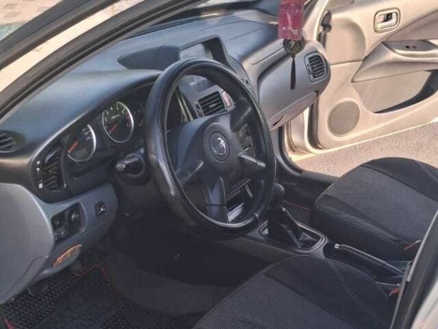 Серый Ниссан Альмера, объемом двигателя 1.5 л и пробегом 3 тыс. км за 2500 $, фото 11 на Automoto.ua