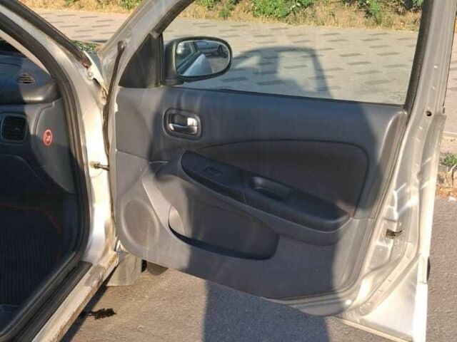 Серый Ниссан Альмера, объемом двигателя 1.5 л и пробегом 3 тыс. км за 2500 $, фото 6 на Automoto.ua