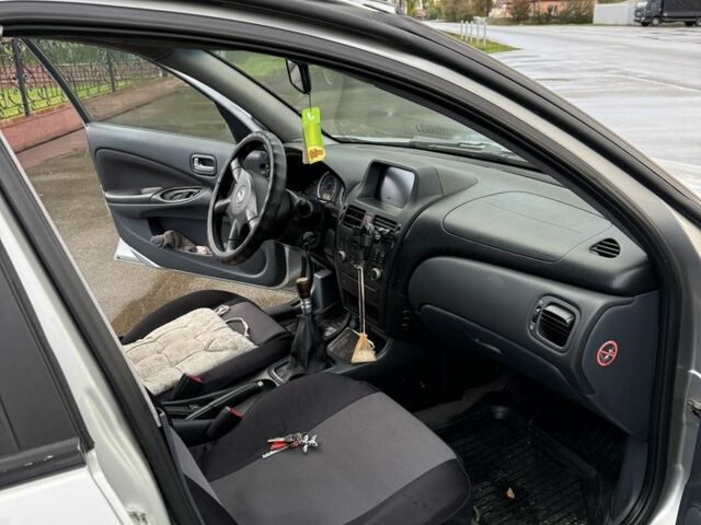 Серый Ниссан Альмера, объемом двигателя 1.5 л и пробегом 540 тыс. км за 3600 $, фото 6 на Automoto.ua