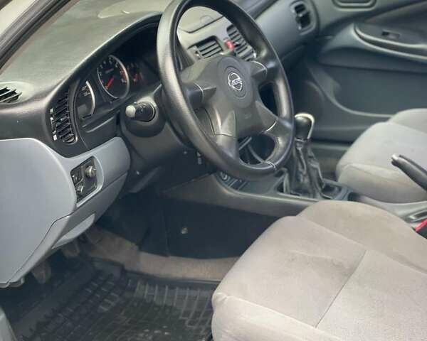 Сірий Ніссан Альмера, об'ємом двигуна 1.77 л та пробігом 320 тис. км за 3299 $, фото 4 на Automoto.ua