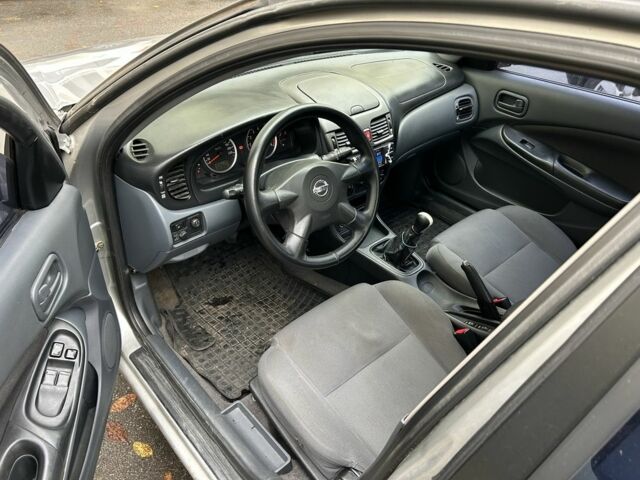 Сірий Ніссан Альмера, об'ємом двигуна 1.8 л та пробігом 320 тис. км за 2500 $, фото 5 на Automoto.ua