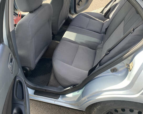 Серый Ниссан Альмера, объемом двигателя 1.77 л и пробегом 248 тыс. км за 4399 $, фото 8 на Automoto.ua