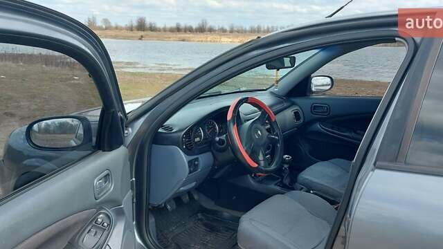 Серый Ниссан Альмера, объемом двигателя 1.8 л и пробегом 312 тыс. км за 3100 $, фото 12 на Automoto.ua