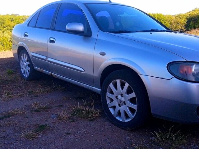 Серый Ниссан Альмера, объемом двигателя 1.5 л и пробегом 296 тыс. км за 2600 $, фото 4 на Automoto.ua