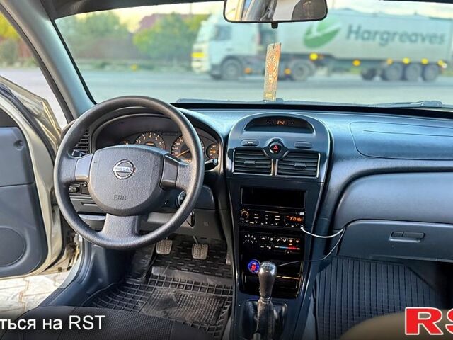 Сірий Ніссан Альмера, об'ємом двигуна 1.6 л та пробігом 340 тис. км за 4199 $, фото 10 на Automoto.ua