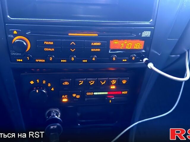 Сірий Ніссан Альмера, об'ємом двигуна 1.6 л та пробігом 340 тис. км за 4199 $, фото 12 на Automoto.ua