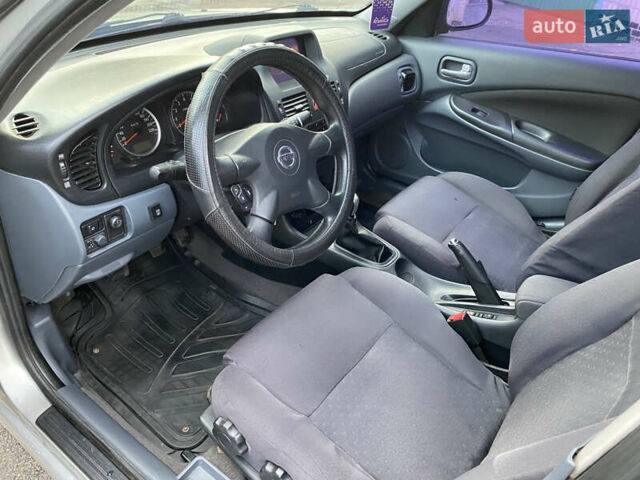 Сірий Ніссан Альмера, об'ємом двигуна 1.5 л та пробігом 299 тис. км за 2850 $, фото 5 на Automoto.ua