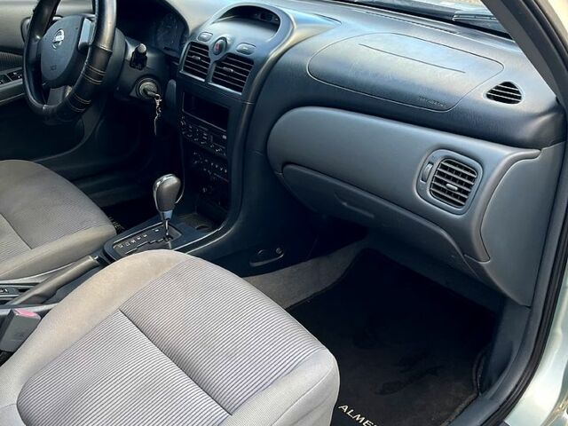 Серый Ниссан Альмера, объемом двигателя 1.6 л и пробегом 185 тыс. км за 4200 $, фото 11 на Automoto.ua