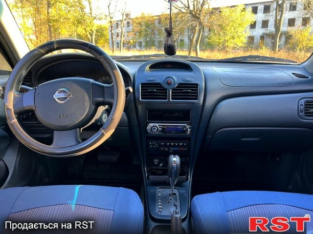 Серый Ниссан Альмера, объемом двигателя 1.6 л и пробегом 100 тыс. км за 5700 $, фото 6 на Automoto.ua