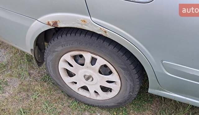 Сірий Ніссан Альмера, об'ємом двигуна 1.6 л та пробігом 420 тис. км за 3210 $, фото 9 на Automoto.ua