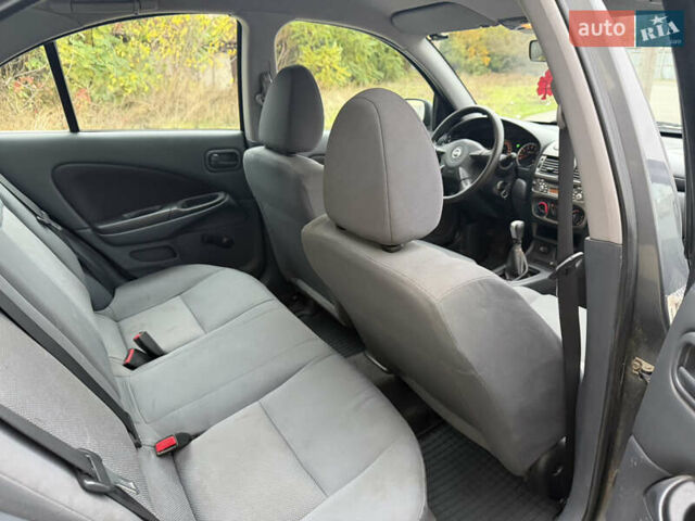 Серый Ниссан Альмера, объемом двигателя 1.8 л и пробегом 105 тыс. км за 3800 $, фото 6 на Automoto.ua