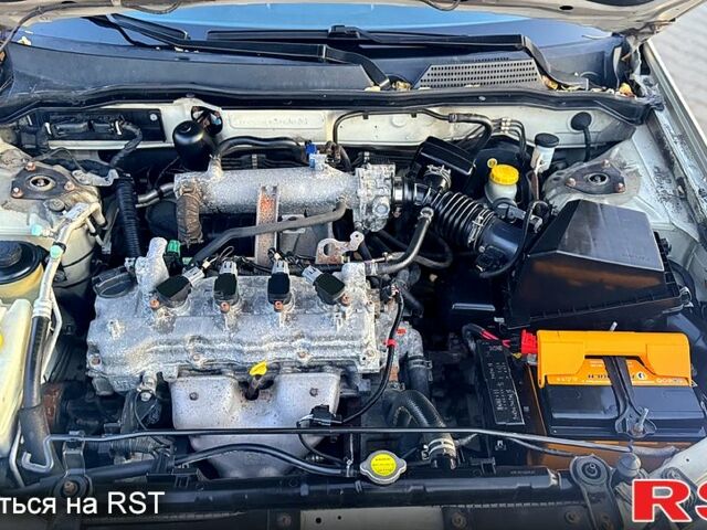Сірий Ніссан Альмера, об'ємом двигуна 1.6 л та пробігом 340 тис. км за 4199 $, фото 11 на Automoto.ua