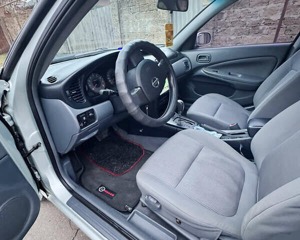 Серый Ниссан Альмера, объемом двигателя 1.6 л и пробегом 210 тыс. км за 4999 $, фото 11 на Automoto.ua