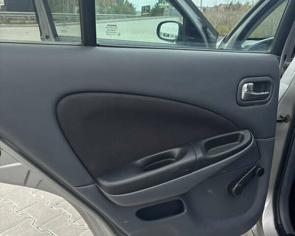 Серый Ниссан Альмера, объемом двигателя 1.5 л и пробегом 266 тыс. км за 3595 $, фото 16 на Automoto.ua