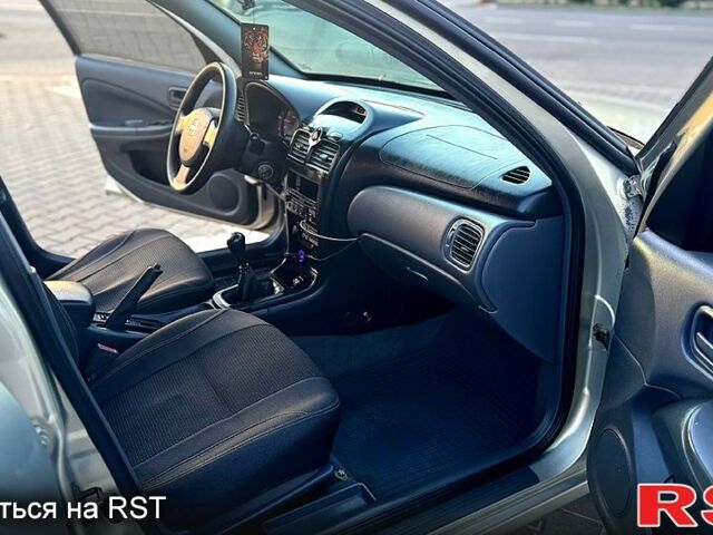 Сірий Ніссан Альмера, об'ємом двигуна 1.6 л та пробігом 340 тис. км за 4199 $, фото 8 на Automoto.ua