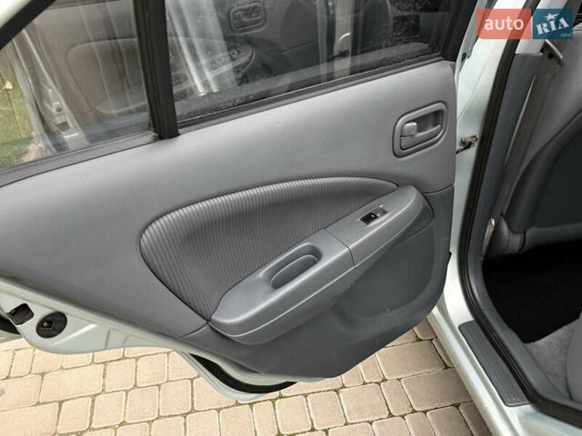 Серый Ниссан Альмера, объемом двигателя 1.6 л и пробегом 136 тыс. км за 5900 $, фото 56 на Automoto.ua